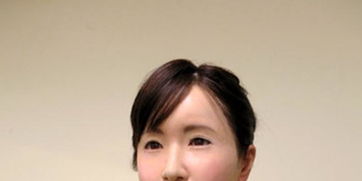 日本研发美女机器人前台可变换口型及表情